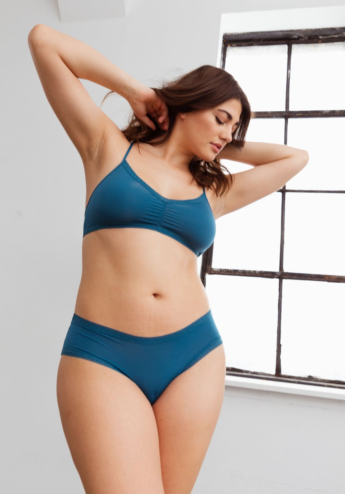 model is wearing an L bralette-green the micro lace trim bralette