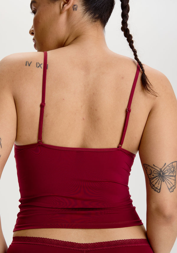 model is wearing an M cami - red the micro lace trim cami