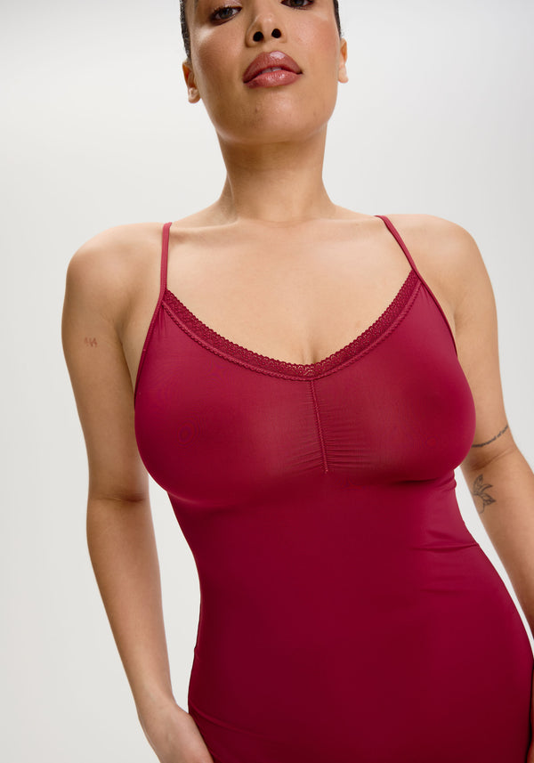 model is wearing an M slip - red the micro lace trim slip