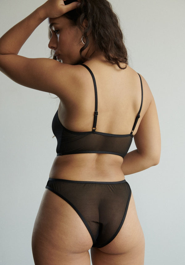model is wearing an XS panty-black weekday high leg bikini