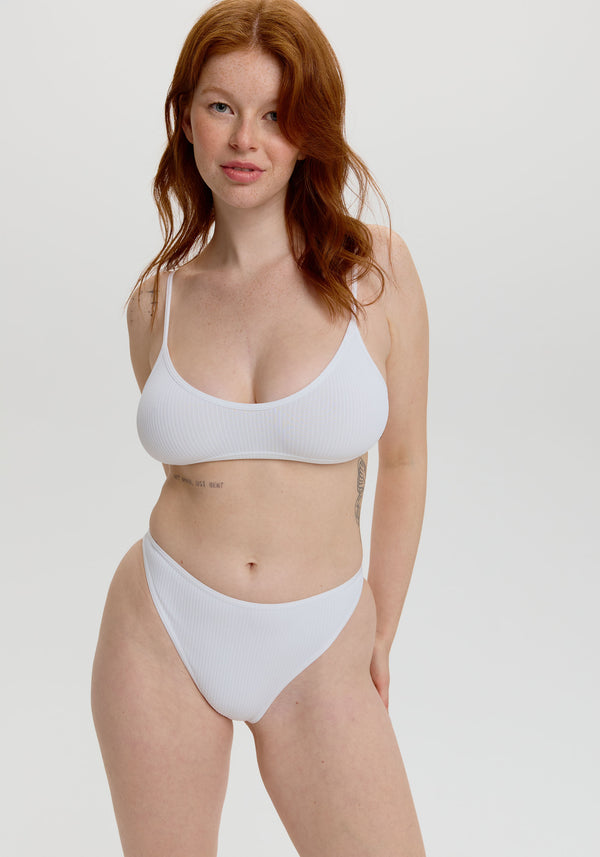 model is wearing an M bralette - white the rib bralette