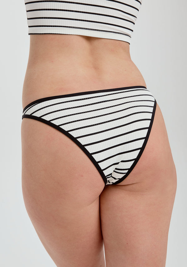 model is wearing an S panty - black,multi,white the rib high leg bikini