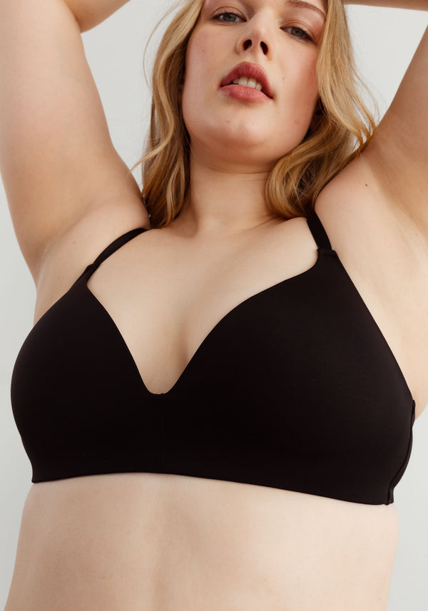 model is wearing a 36D bra-black the no-show lightly lined wireless bra