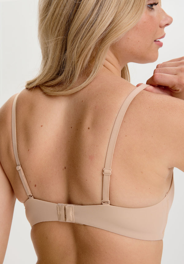 model is wearing a 32D bra - nude the no-show lightly lined wireless bra
