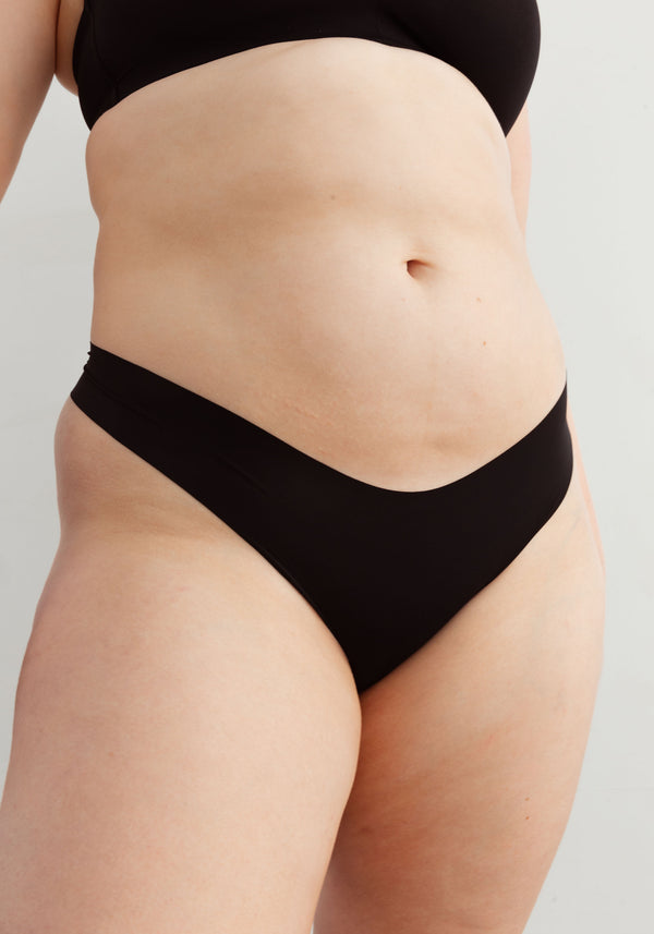 model is wearing an S panty-black the no-show thong
