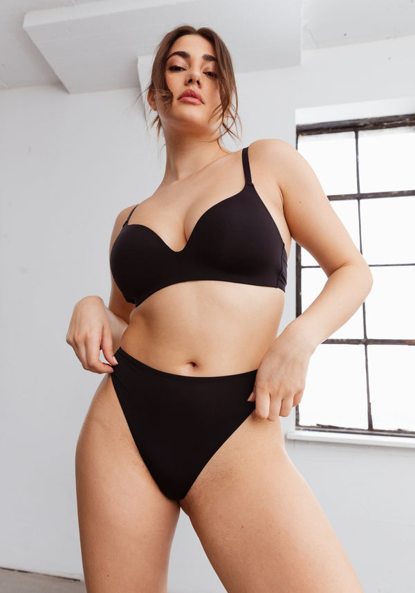 model is wearing an M panty-black the micro high leg thong