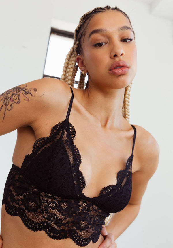model is wearing an M cami-black maze crop cami