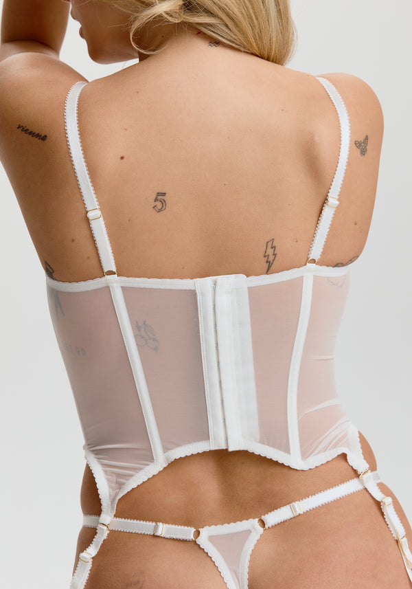model is wearing an S corset-white enchant corset