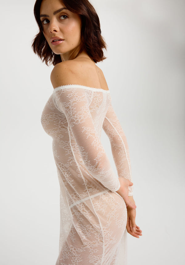 model is wearing an XS maxi dress - white cascade maxi dress
