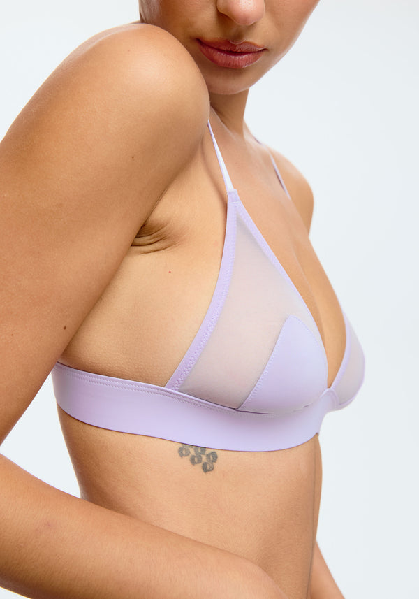 model is wearing an S bralette-purple caché bralette