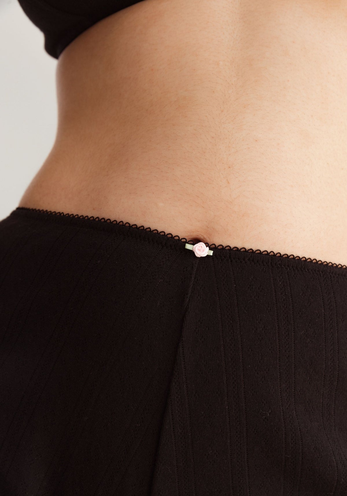 model is wearing an S short - black dream cotton pointelle short