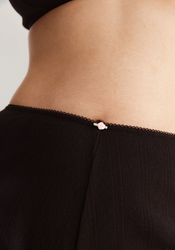 model is wearing an S short - black dream cotton pointelle short