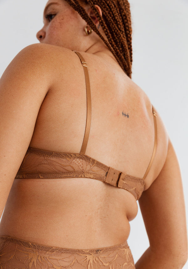 model is wearing a 34C bra-brown euphoria unlined balconette bra