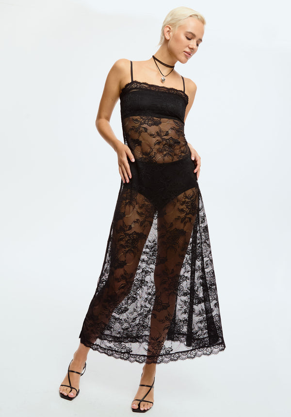 model is wearing an XS maxi dress-black venus maxi dress