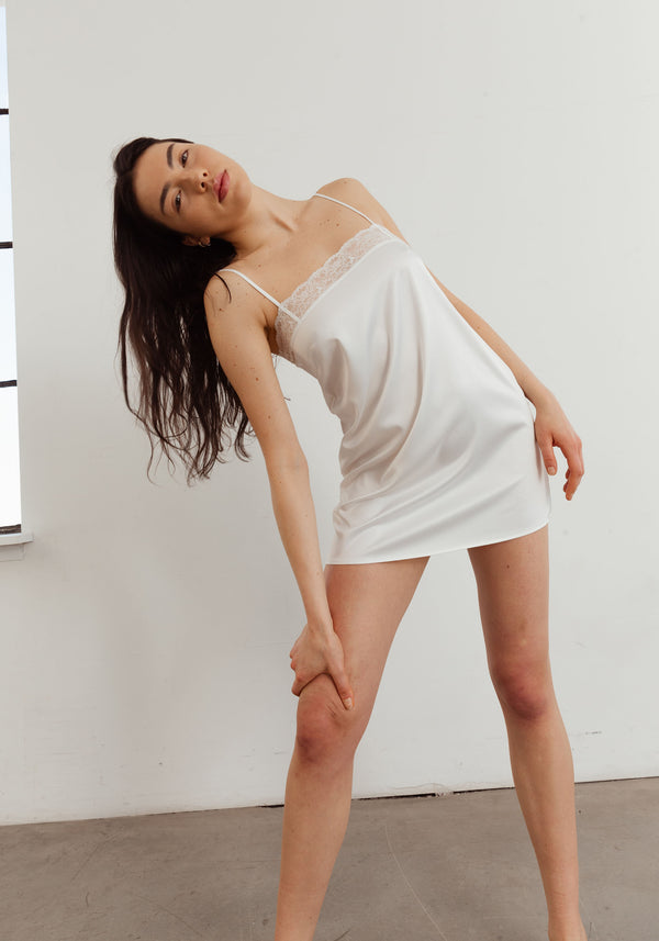 model is wearing an S slip-white eden slip