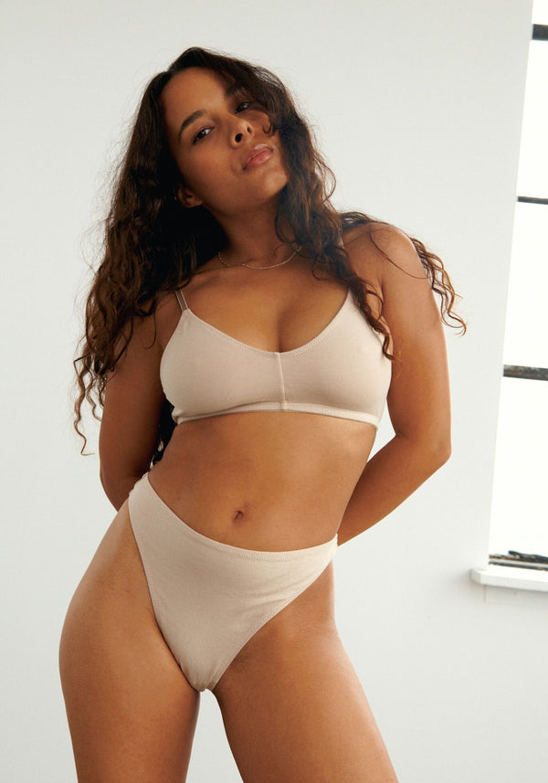 model is wearing an S bralette-nude the cotton bralette