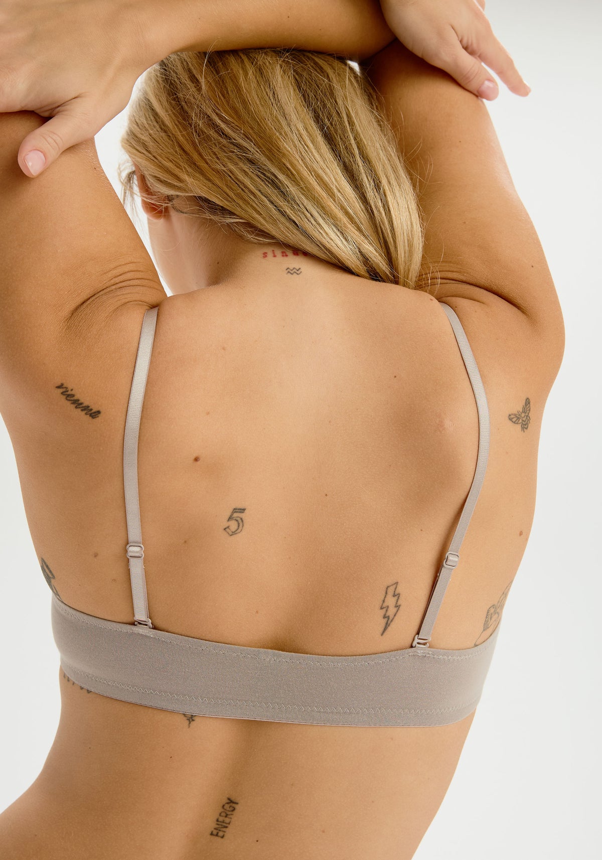 model is wearing an S bralette - grey the cotton bralette