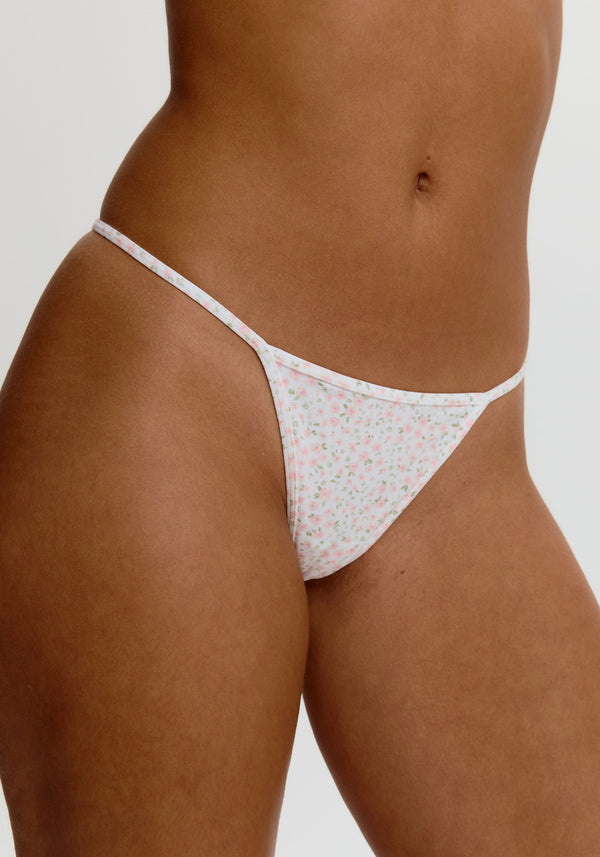 model is wearing an S panty - multi,white the cotton string