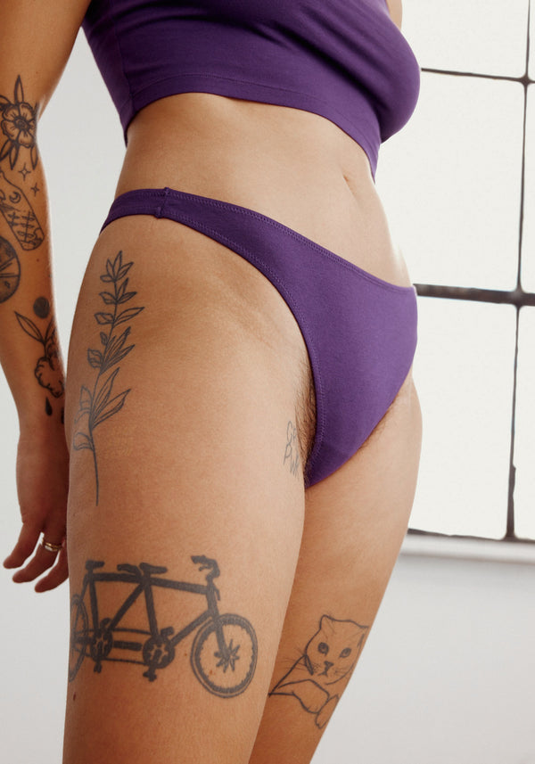 model is wearing an S panty-purple the cotton low rise thong