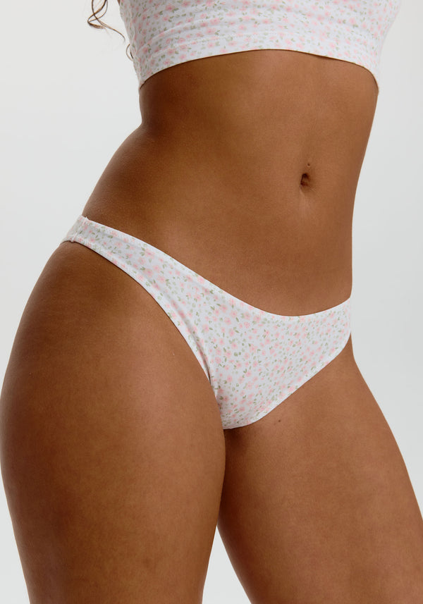 model is wearing an S panty - multi,white the cotton low rise bikini