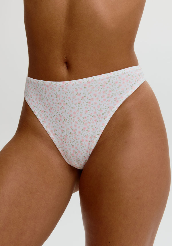 model is wearing an S panty - multi,white the cotton high leg thong
