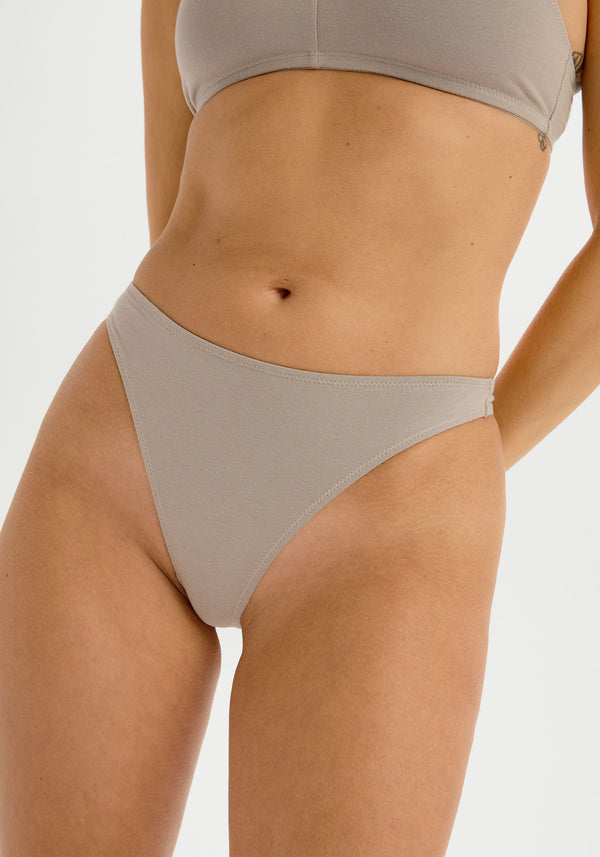 model is wearing an S panty - grey the cotton high leg thong