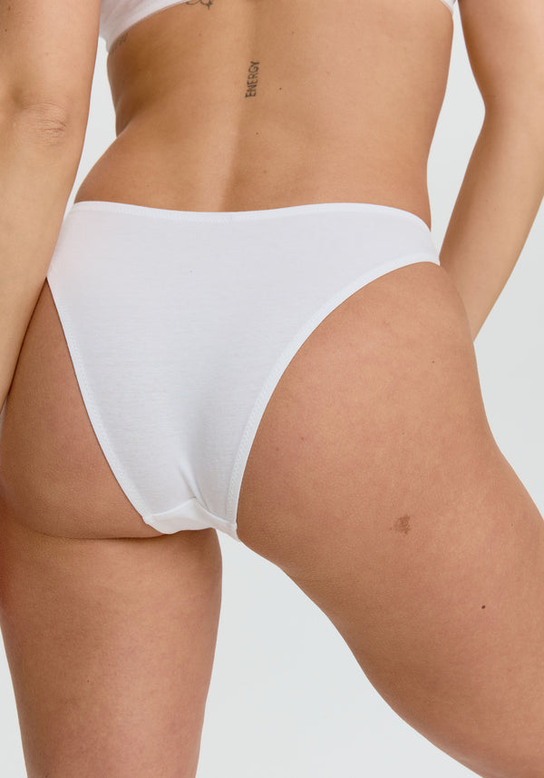 model is wearing an S panty-white the cotton high leg bikini