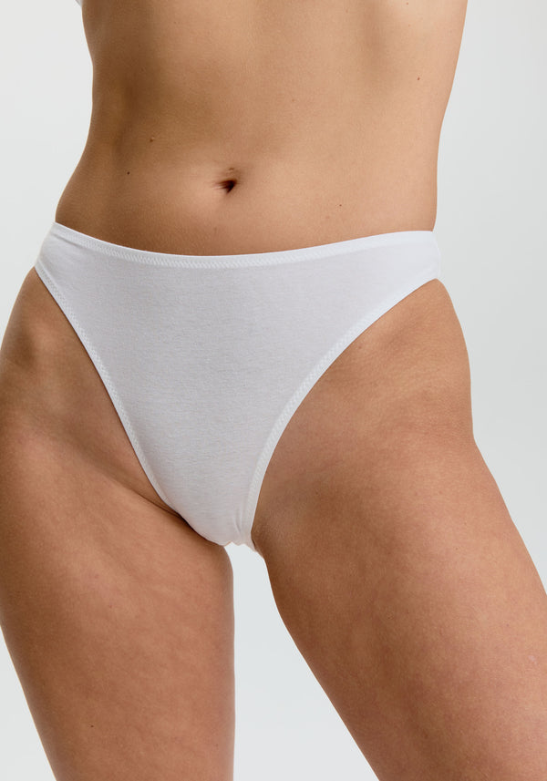 model is wearing an S panty-white the cotton high leg bikini