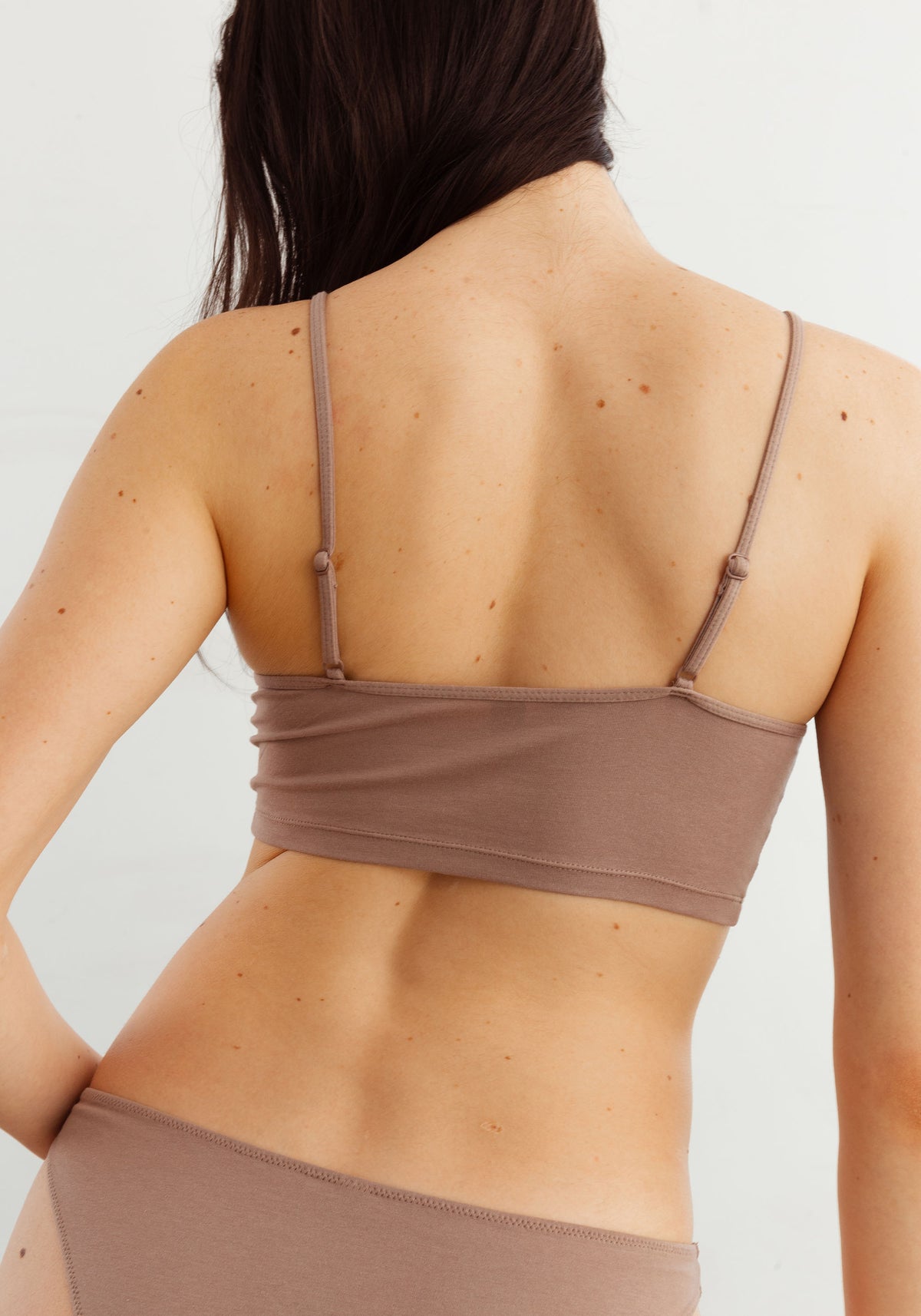 model is wearing an S cami-nude the cotton crop cami