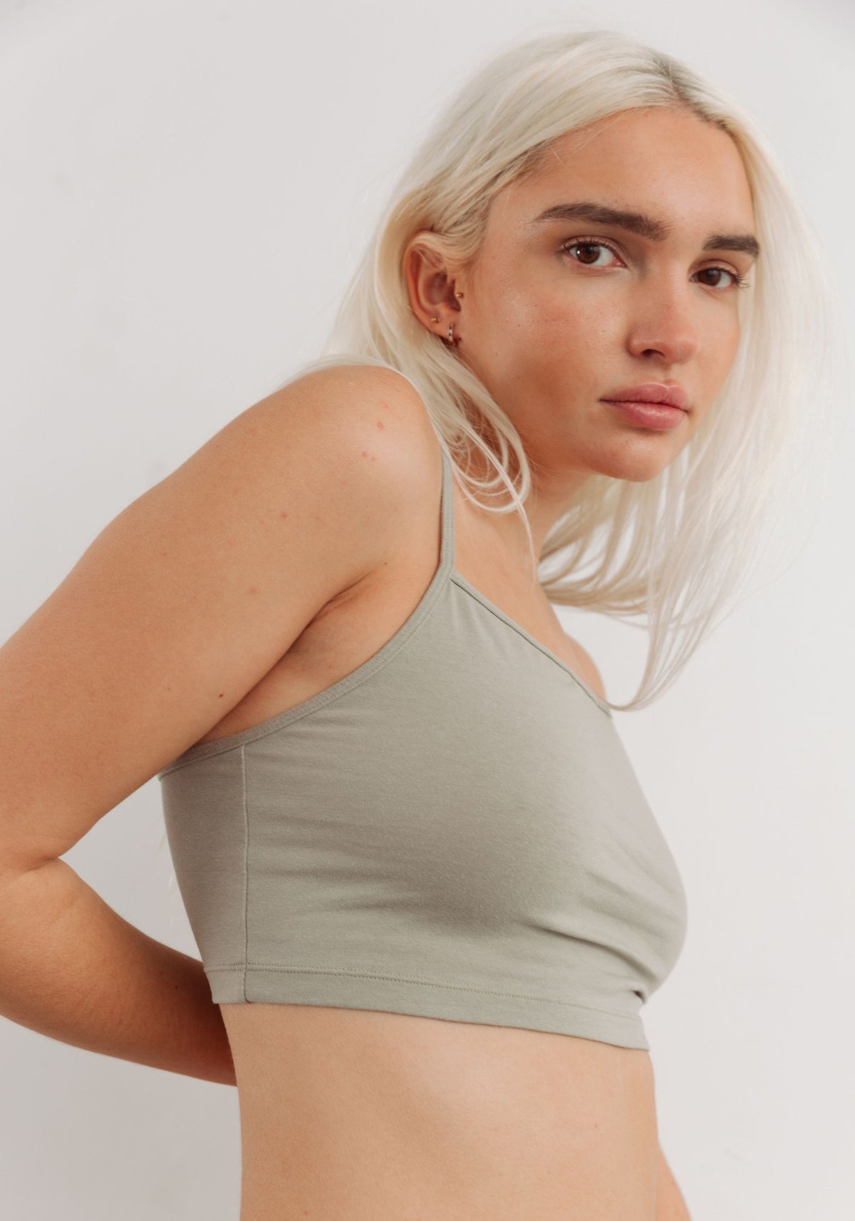 model is wearing an S cami-green the cotton crop cami