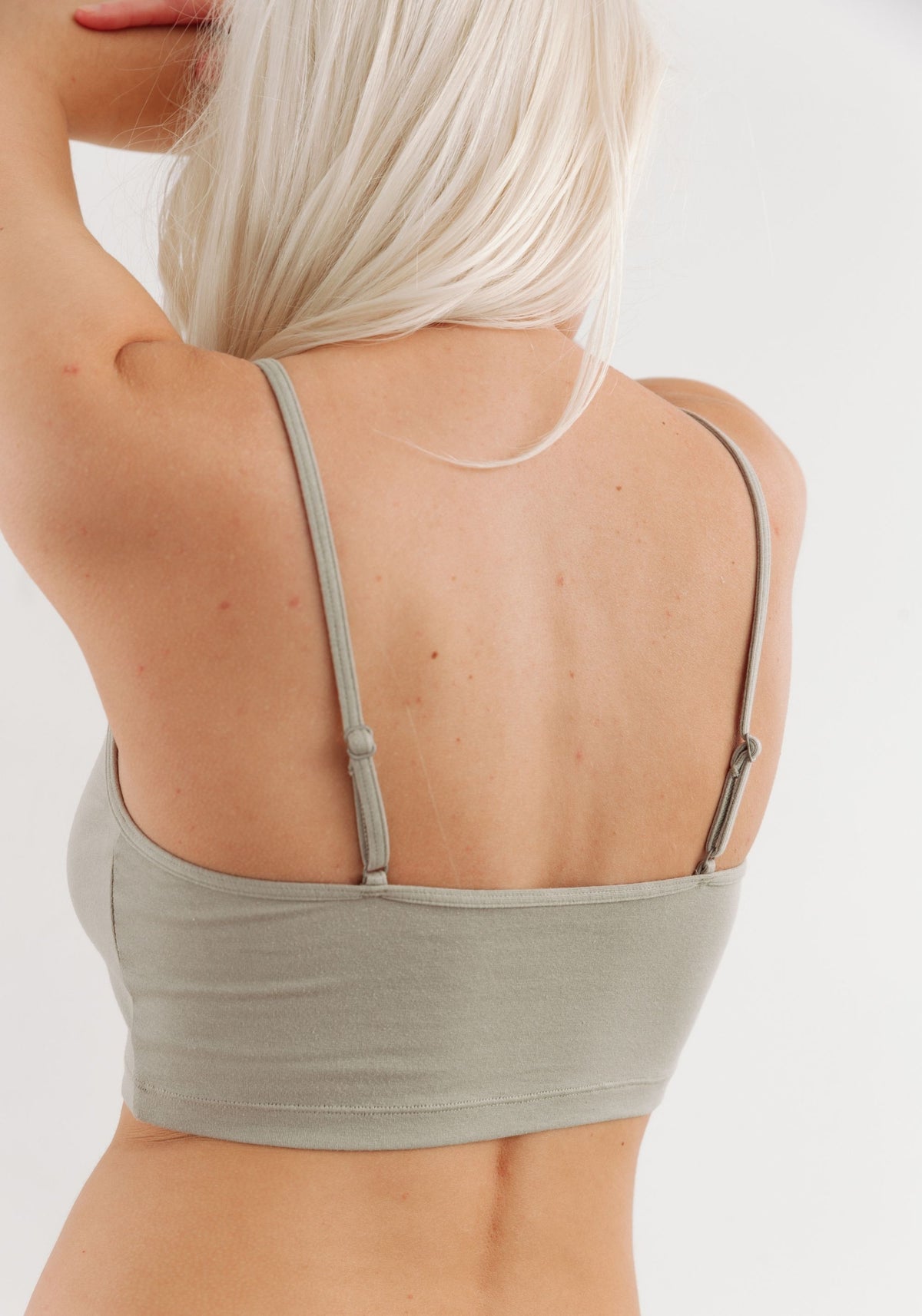 model is wearing an S cami-green the cotton crop cami