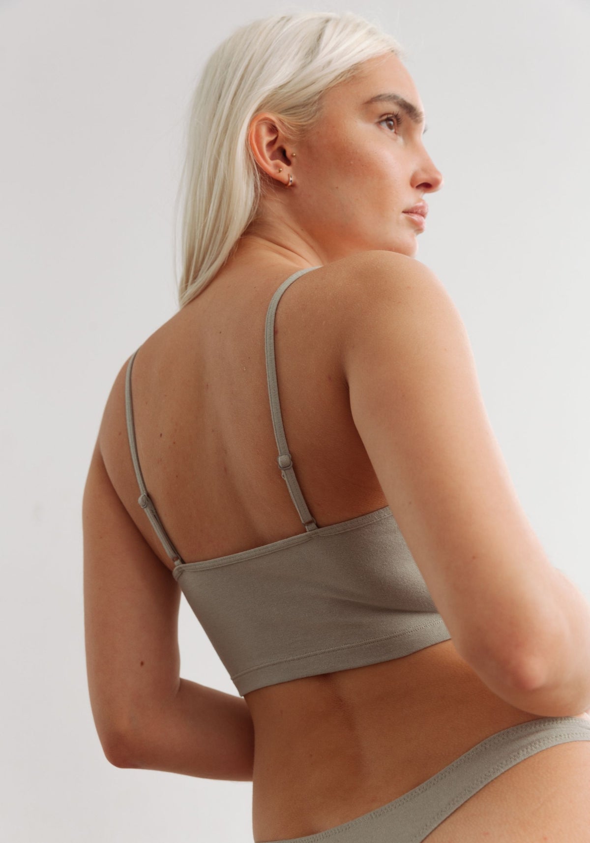 model is wearing an S cami-green the cotton crop cami