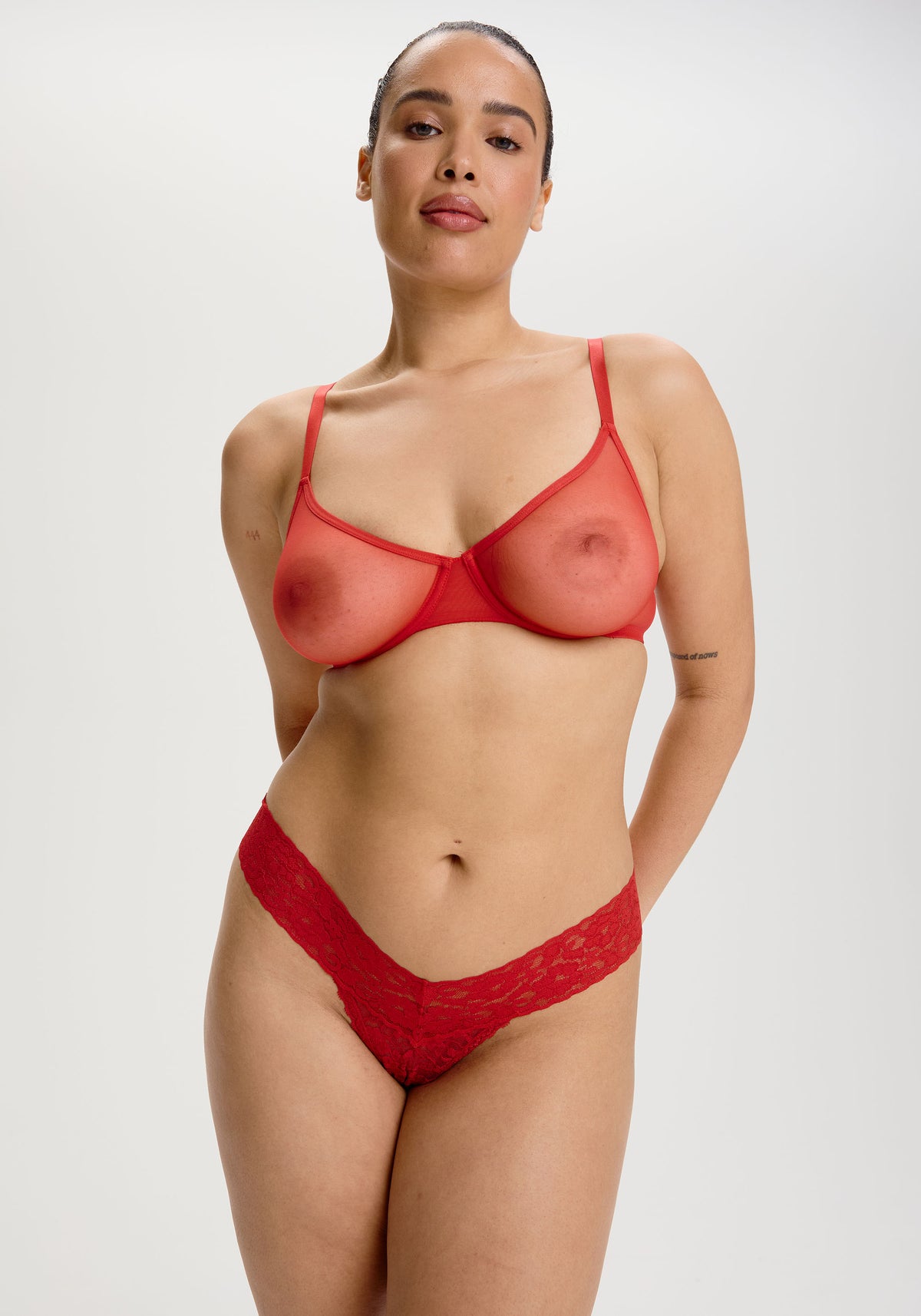 model is wearing an M panty - red the lace band thong