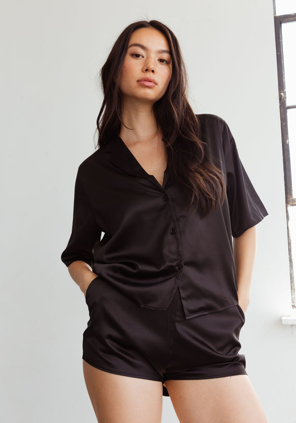 model is wearing an S short-black after hours satin short