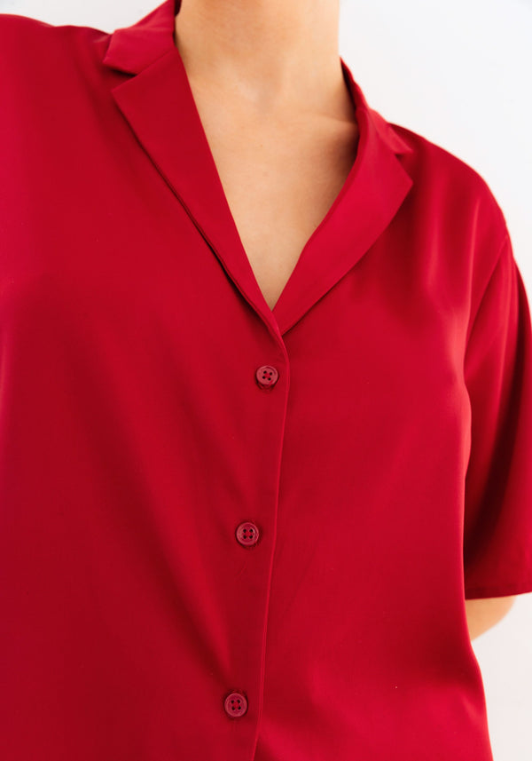 model is wearing an S top-red after hours satin top