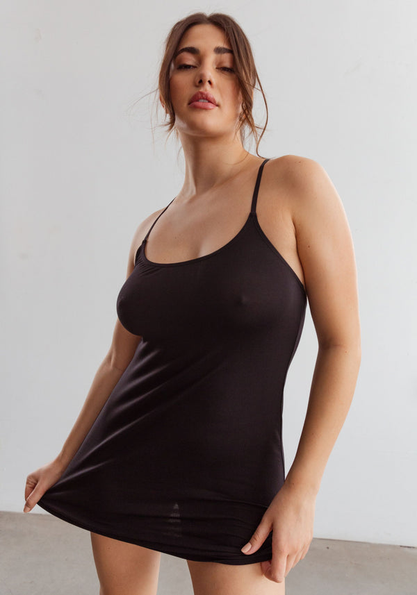 model is wearing an M slip-black unplug modal slip dress
