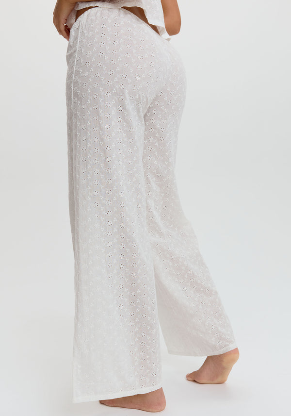 model is wearing an S pant - white wander embroidered eyelet pant