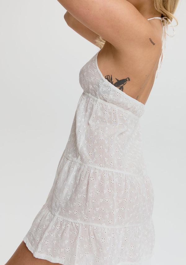 model is wearing an S dress - white wander embroidered eyelet halter dress