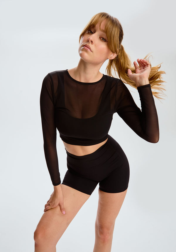 model is wearing an S top-black pulse long sleeve crop top