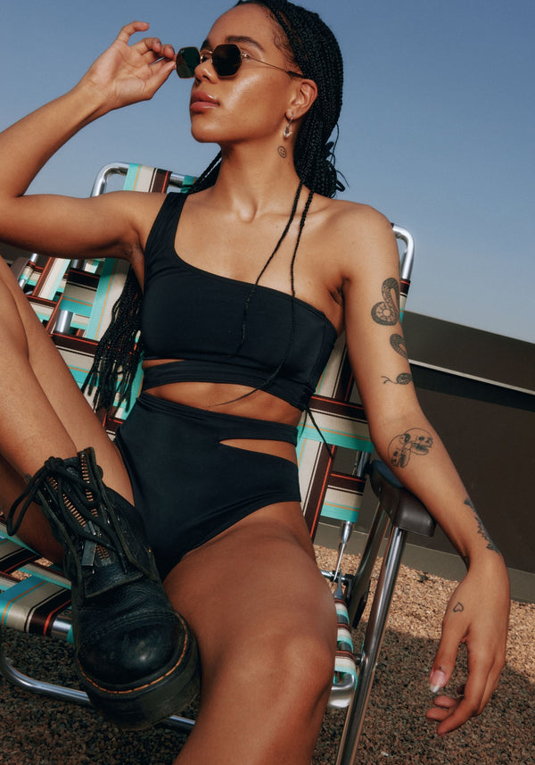 model is wearing an XS bikini bottom-black jade high waist bikini bottom
