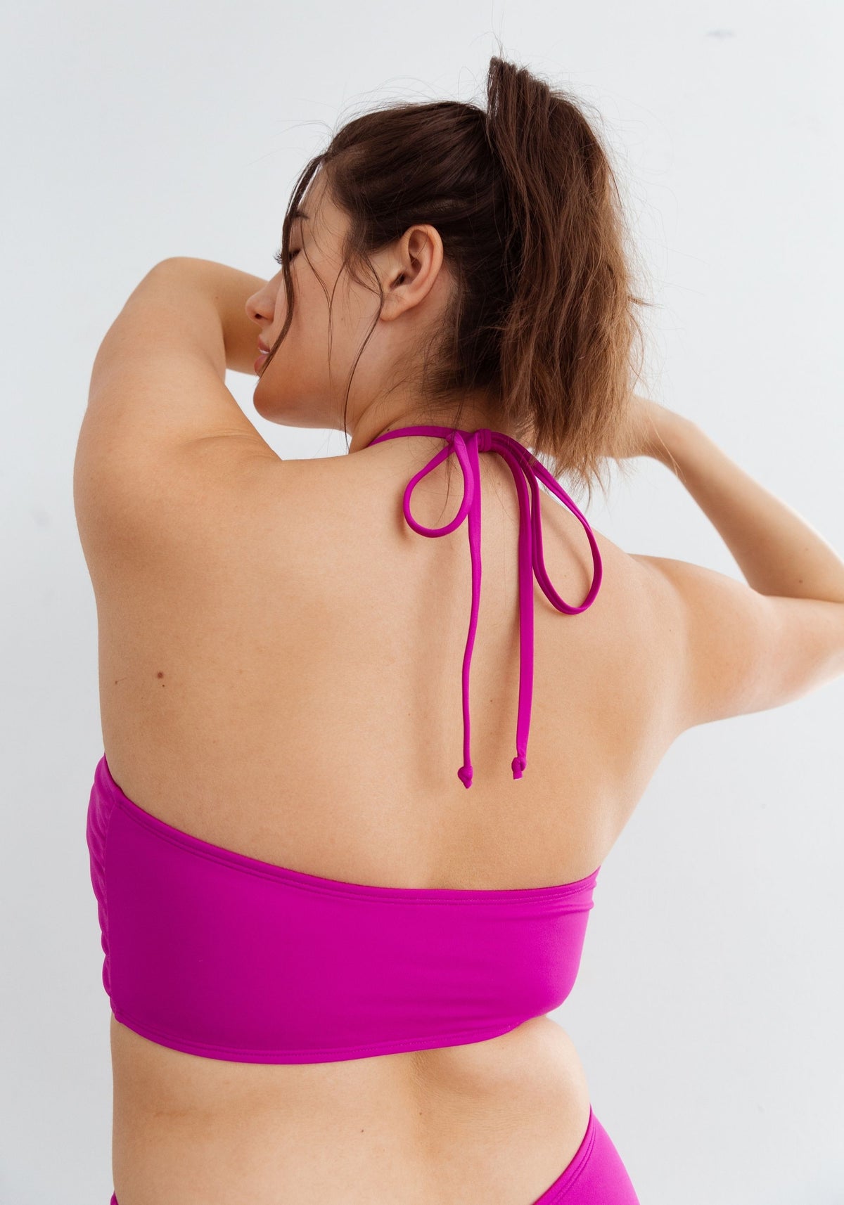 model is wearing an M one-piece swimsuit-pink,purple palm bandeau one-piece swimsuit