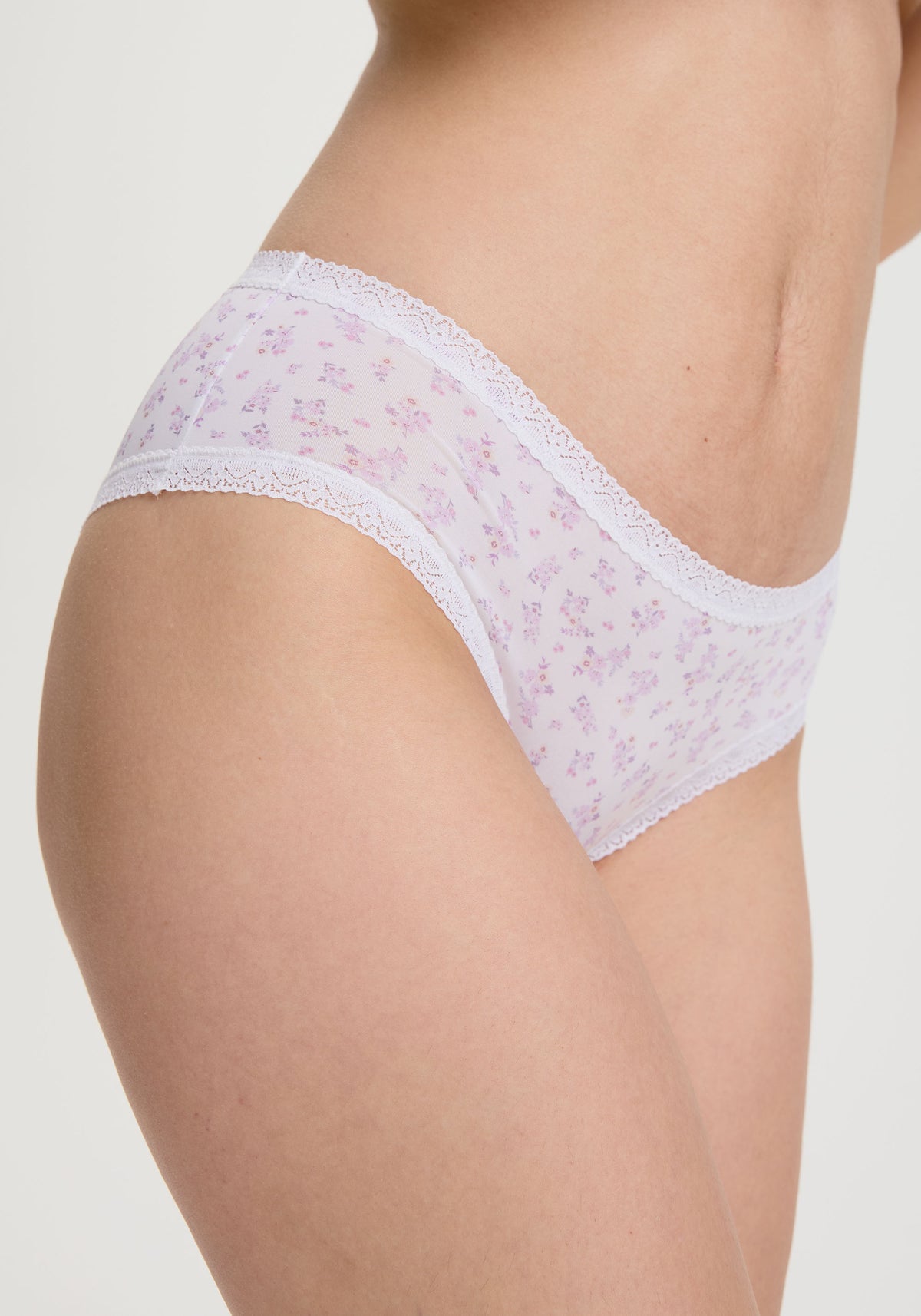model is wearing an XS panty - multi,white the micro lace trim hipster