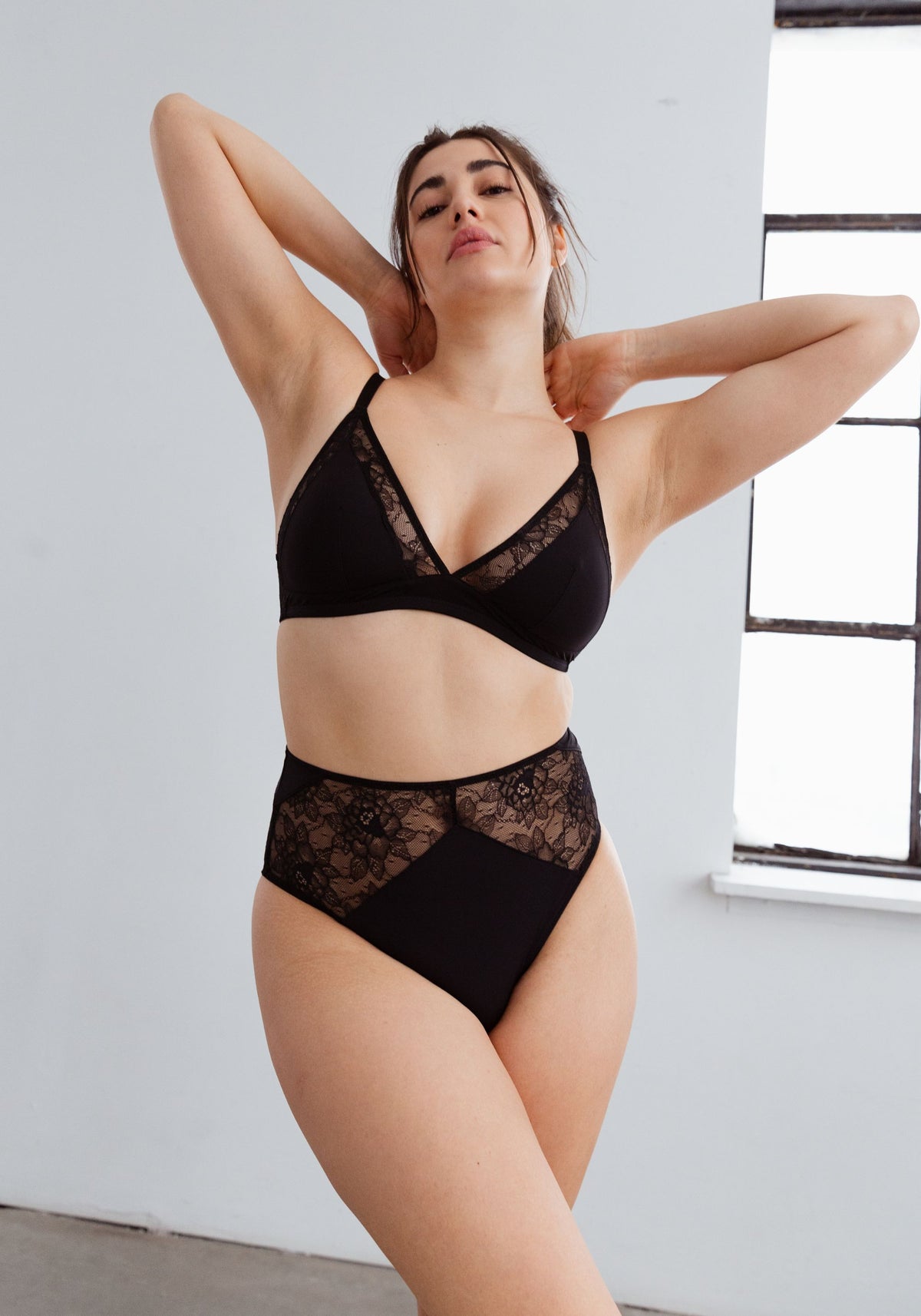 model is wearing an M panty-black stellar high waist brief
