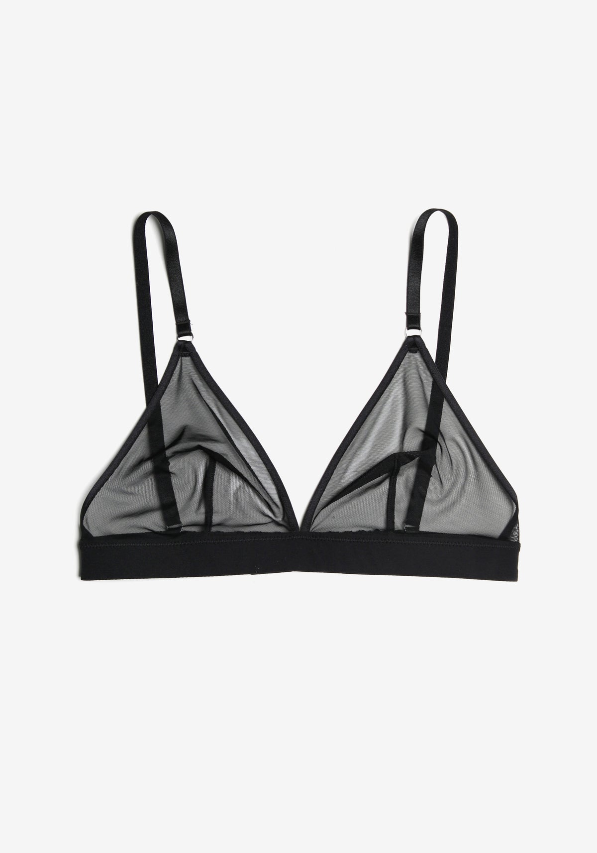 model is wearing an M bralette-black delirium bralette