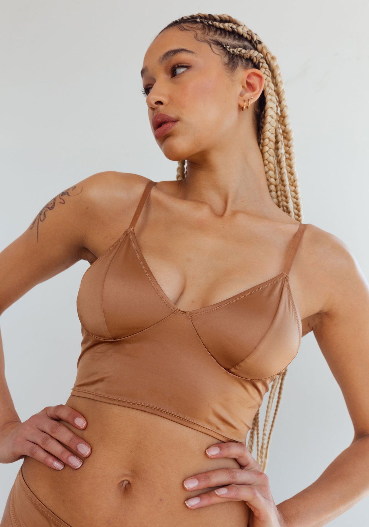 model is wearing an M cami -brown shade crop cami