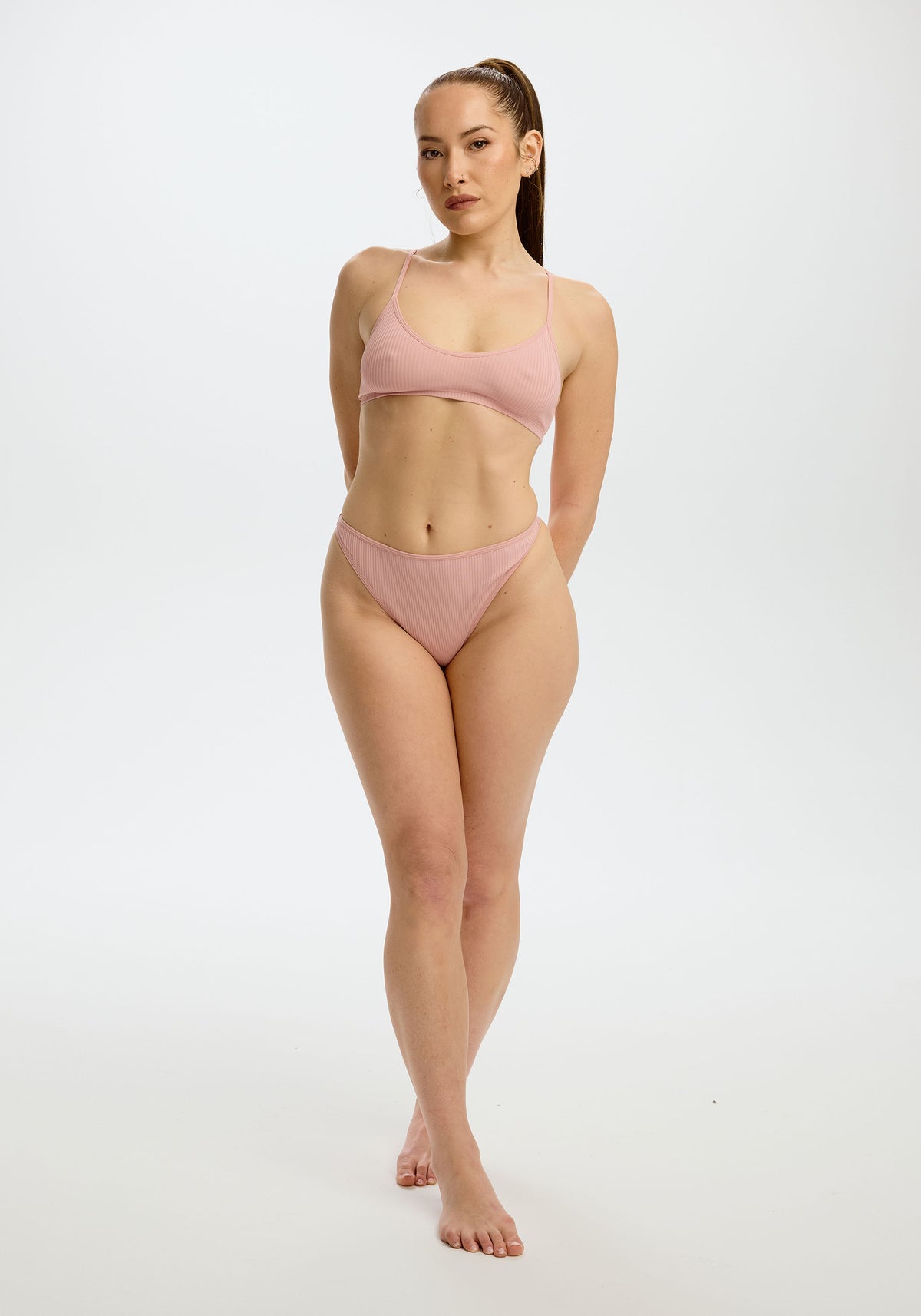 model is wearing an M panty - pink the rib high leg thong