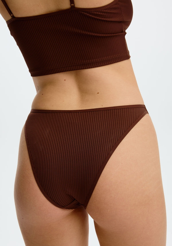 model is wearing an S panty - brown the rib high leg bikini