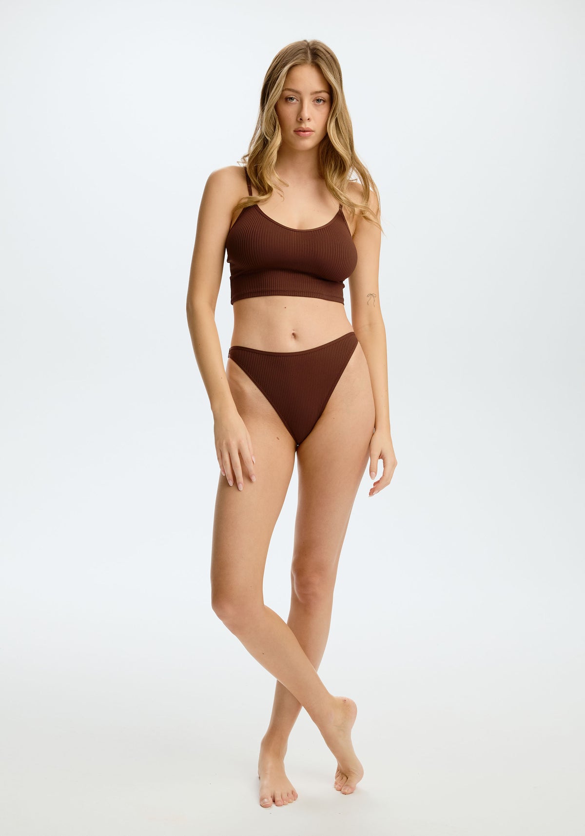model is wearing an S panty - brown the rib high leg bikini