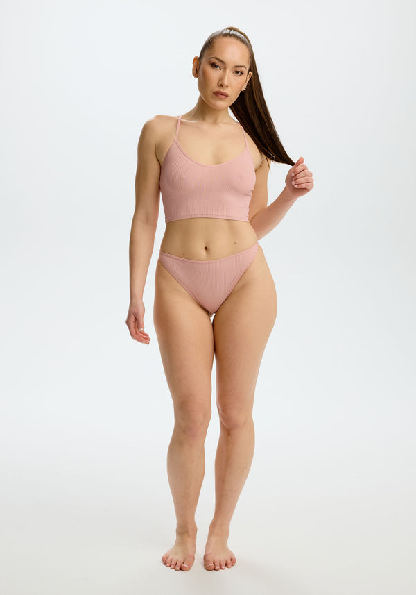 model is wearing an M panty - pink the rib high leg bikini