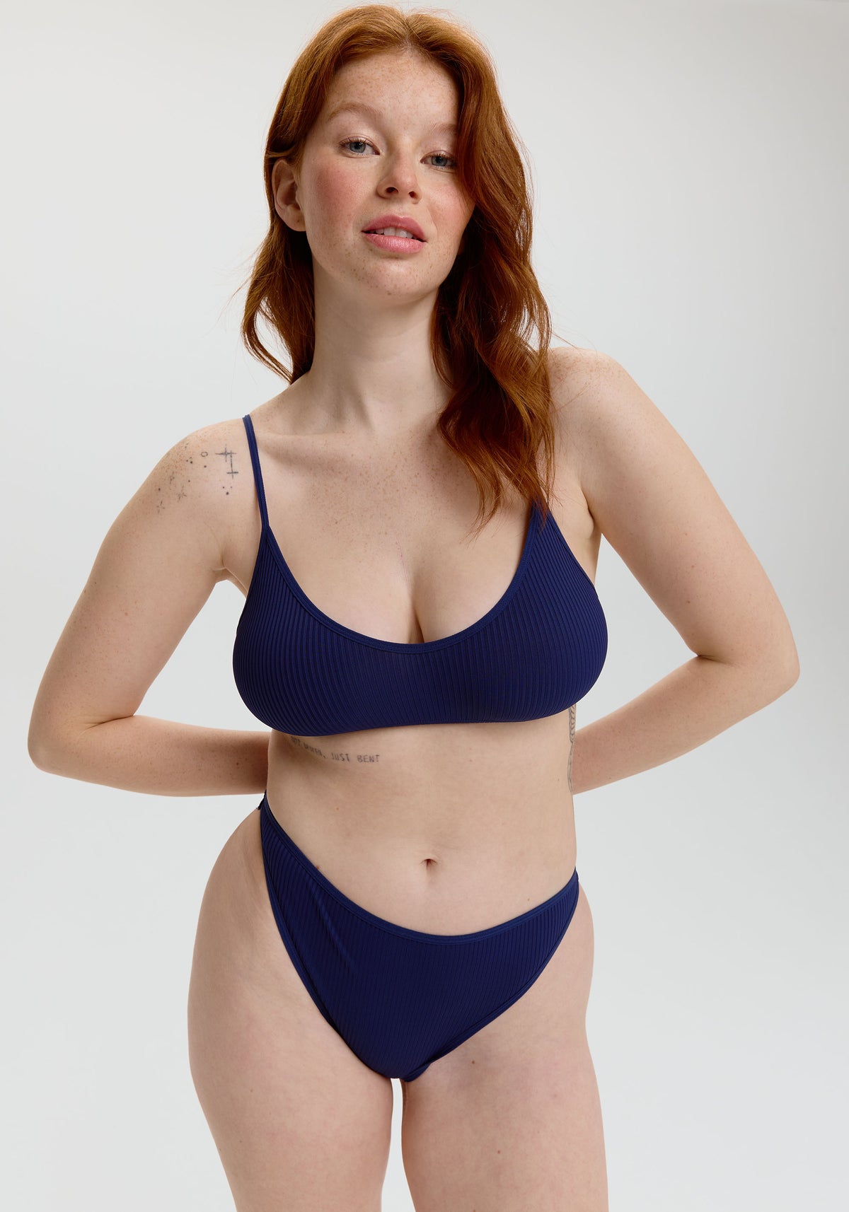 model is wearing an S panty - blue the rib high leg bikini